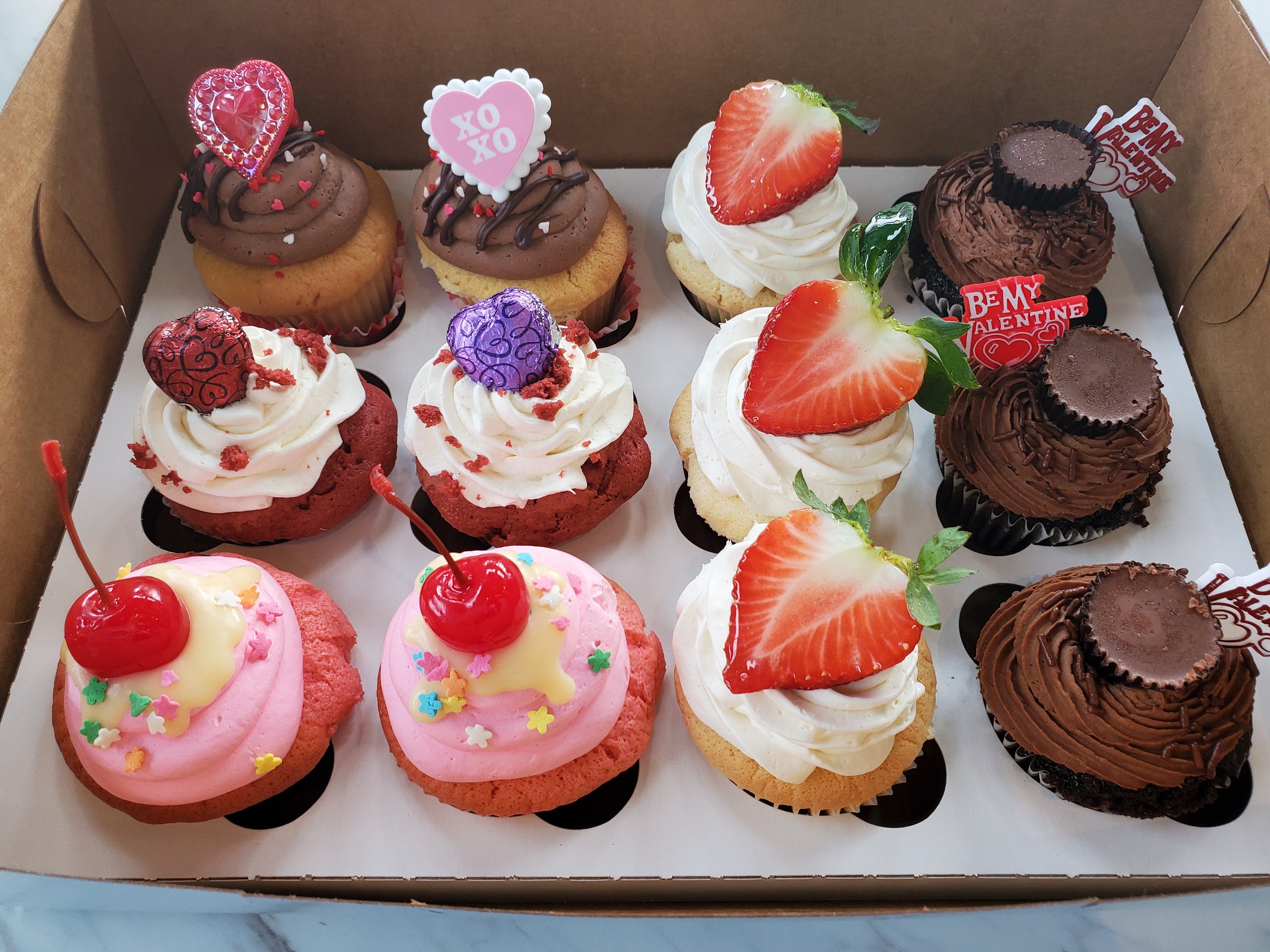 A dozen cupcakes | Tasty Doux Bakery